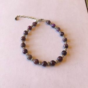 Adjustable bracelet or ankle bracelet